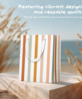 All In One Gift Bag Set With Four Medium 9 Inch Bags on stone ledge with sea background