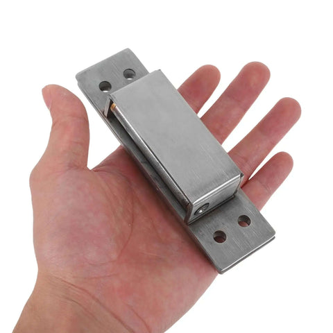 Hand holding a Concealed Adjustable 5 Inch Silver Door Hinge For Wooden Cabinets And Secret Bookcases, heavy duty invisible hinge