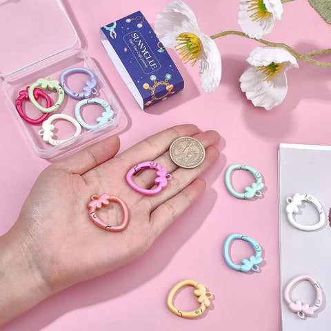 14 Color Spring Gate Ring Set with Strawberry Trigger Snap Buckles for Keychains and Craft Projects, assorted colors displayed.
