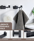 Matte Black Stainless Steel Double Towel Hooks For Wall Mount displaying towel and sponge; SUS304, space-saving, fast drying.