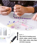 Hands assembling beads with DIY Drilling Tool Kit For Wood Jewelry And More 18 Piece Mini Twist Drill Set shown below