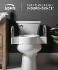 Bolt On Four And A Half Inch Raised Toilet Seat With Sturdy Support Handles No Wobble Hinges That Stay Tight Fits Round And Elongated Toilets Makes Sitting And Standing Easier And Safer installed on a toilet in a modern bathroom.