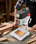 Powerful 340W Benchtop Drill Press With 3 Speed Corded Mini Drill For DIY Metal And Plastic Projects, stable base in workshop.