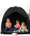 Zero Hassle Snap Together Blackout Tent For Pack And Play with kids playing inside, ideal for creating a dark room environment.