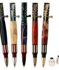 Kickin DIY Woodturning Project Kit Featuring Five Ceramic Flag Ballpoint Pen Hardware Sets And Precision Bushings For Turning Custom Writer Accessories - Five stylized pens with ceramic tops and bushings.