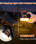 Rechargeable LED Camping Lantern With Remote Control, 1000 Lumen Tent Light hanging on hook outdoors at night