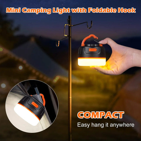 Rechargeable LED Camping Lantern With Remote Control, 1000 Lumen Tent Light hanging on hook outdoors at night