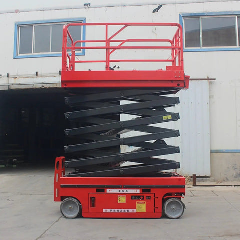 Heavy Duty Mobile Scissor Lift Pumping Smooth Hydraulic Power And Roomy Anti Slip Platform For Grunt Work Job Sites And Facility Pros Demanding Zero Drama Elevated Access Day After Day with red frame and steel chassis.