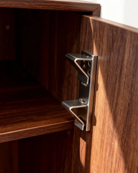 Close-up of Heavy Hitter 18 Piece Silver Steel Shelf Clip Kit, showcasing a bracket mounted for stable wooden shelf support.