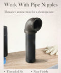 10 Pack One Half Inch Malleable Cast Iron Pipe Elbows 90 Degree Fittings For Threaded Black Pipes on wooden surface