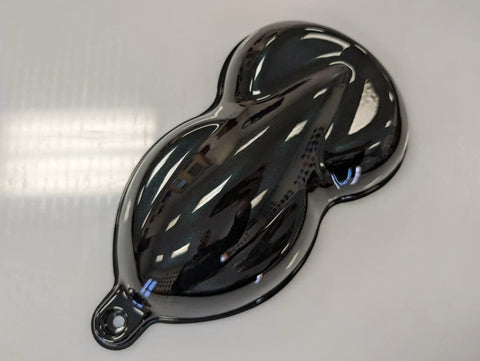 Premium Quality Hella Smooth Ready Mixed Tinted Teal Auto Paint Basecoat Full Gallon With Slow Reducer Added For Easy Spray Gun Coverage And Factory Fresh Custom Finish on a glossy spray sample.
