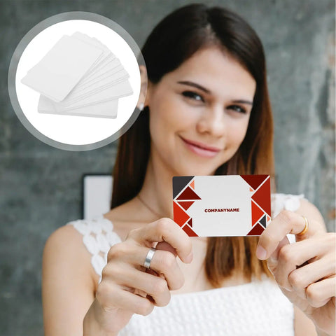 20 Pack Of Top Shelf Blank White PVC ID Cards Sized At 85X54MM crafted for double sided printing, displayed by a woman.