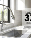 Chrome Pull-Down Kitchen Faucet With Two-Function Sprayer, Single Hole Mount, shown installed in a modern kitchen