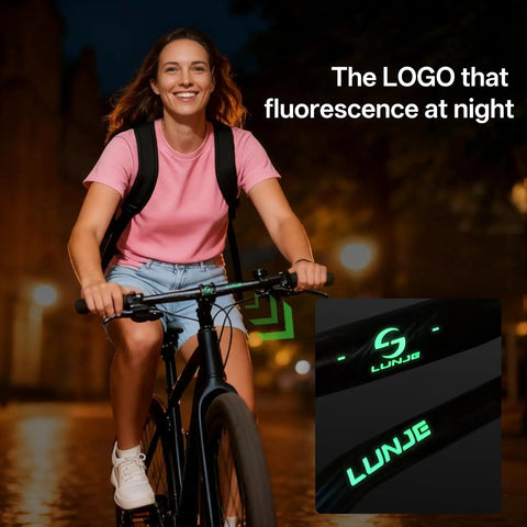 Woman riding bike with Dope Mountain Bike Handlebar 31.8mm Clamp, glow in the dark logo, viewed at night.
