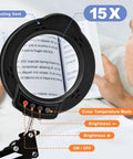 Person using 15X Lighted Magnifying Glass With Clamp Desk Lamp LED Magnifier For Reading And Close Work, showing controls
