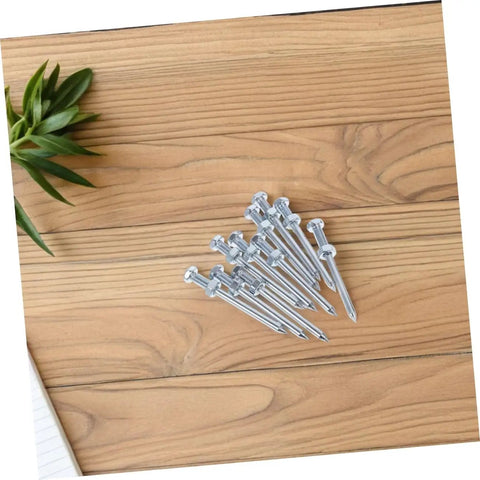 Heavy Duty Lawn Aerator Shoes With Spikes Set Of 12 Workhorse Footwear spikes shown on wooden surface