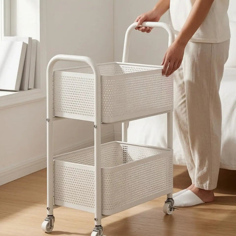 Rock Solid Two Tier Rolling Storage Cart With No Sweat Mobility And Compact Perforated Metal Baskets Ideal For Living Rooms Offices And Daily Grind featuring a person using the cart.