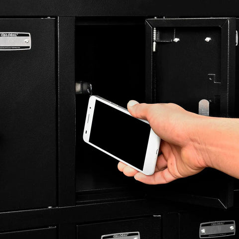 Built Different 12 Door Tablet And Cell Phone Locker featuring keyed differently locks with someone placing a smartphone inside.