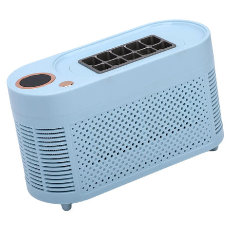 Portable Mini Ice Maker Countertop Chill Factory with sleek blue design and clear ice cube tray for quick ice production.