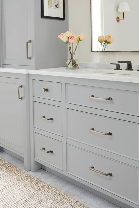 Westerly Graphite Cabinet Pull 6-5/16 Inch Center-To-Center, 7-9/16 Inch Overall Length, installed on grey kitchen cabinets