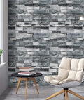 Grey Faux Brick Peel And Stick Wallpaper Dope Look Self Adhesive Removable for modern living room decor with chair and table.