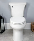 Linden Soft Close Toilet Seat 2 Pack Non Slip Heavy Duty Wood Round White Easy Install Made In USA shown on toilet bowl