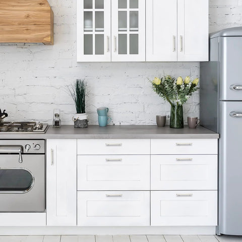 Modern kitchen with white cabinets featuring Brushed Nickel Cabinet Handles Set Of 10 Square Pulls 4-1/2 Inch Center To Center.