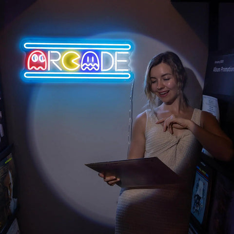 Woman reading under Large Arcade Neon Sign 25 Inches Upgraded Retro Ghost Arcade LED Light Handmade Aesthetic Night Lamp for Game Room