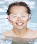 Heavy Hitting Splash Guard Safety Glasses Six Pack Tough As Nails Impact Resistant Work Eyewear Scratch Resistant Anti Fog Protective Goggles in use by a smiling child in a pool.