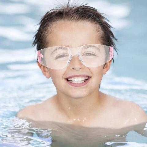 Heavy Hitting Splash Guard Safety Glasses Six Pack Tough As Nails Impact Resistant Work Eyewear Scratch Resistant Anti Fog Protective Goggles in use by a smiling child in a pool.