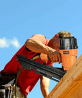 Worker using 21 Degree Full Round Head Framing Nailer With Tool-Free Depth Adjust, Optional Bump Fire Trigger on a roof