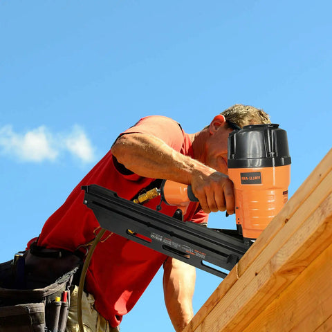Worker using 21 Degree Full Round Head Framing Nailer With Tool-Free Depth Adjust, Optional Bump Fire Trigger on a roof