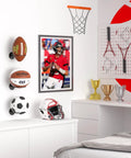 Two Pack Wall Mount Basketball Racks Black Space Saving Ball Holder For Home Gym Or Bedroom Decor Keeps Basketballs Footballs Rugby Balls And Volleyballs Organized Like A Pro In Small Spaces displayed in a sports-themed bedroom with trophies and rackets.