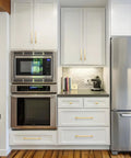 Modern white kitchen with 10 Pack Brushed Gold Cabinet Handles 6 Inch Length With 5 Inch Center To Center Hole, solid metal, anti-fingerprint finish, easy install.
