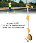 Baxnore Digital Display Measuring Wheel Accurate Distance Measure Tool with Backlit Multifunction Metric Imperial in use on road.