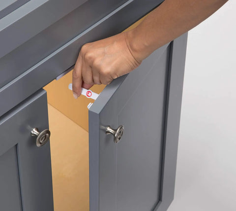 Eight Piece Adhesive Cabinet Latches In White, Easy Peel And Stick Install, No Tools Needed For Most Cabinets, shown installed