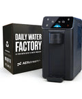 GW Pro Daily Water Factory Atmospheric Water Generator, front view, next to packaging, delivers 10 liters per day.