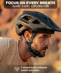 EMTB Mountain Bike Helmet NTA8776 Certified With Triple Protection worn by cyclist, matte black medium, side view