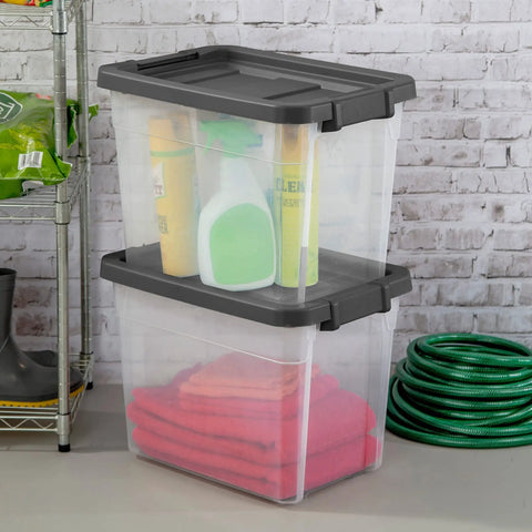 Modular Clear Box Stacker 30 Quart Storage System stacked with cleaning supplies and towels, stackable plastic storage bins for home.