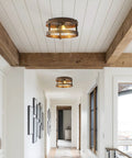 Hallway with dark brown wood and oil rubbed bronze three light iron flush mount ceiling light, farmhouse industrial round fixture seen from below.