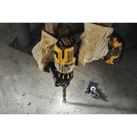 Heavy Hitter 20 Volt Max Brushless Cordless Hammer Drill Kit in use, drilling into concrete with metal bits.