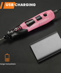 4V Cordless Rotary Tool Kit With 3 Speeds Up To 18,000 RPM in pink, connected to USB power bank, showing portability and charging.