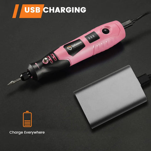 4V Cordless Rotary Tool Kit With 3 Speeds Up To 18,000 RPM in pink, connected to USB power bank, showing portability and charging.