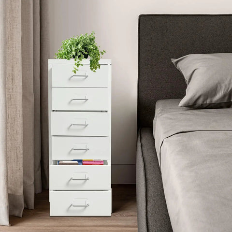 Heavy Duty Six Drawer Metal File Cabinet With Smooth Ball Bearings Slick White Rolling Filing Cabinet For Home Office beside a bed.