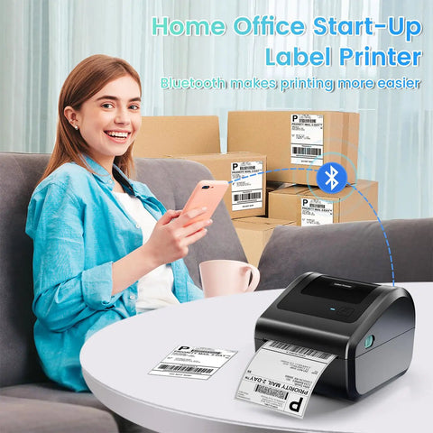 Compact Bluetooth 4x6 Thermal Shipping Label Printer D450BT for Small Business shown printing a label beside a woman with a phone