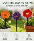 Handmade Ceramic Mini Pollinator Watering Station For Outdoor Gardens in three colors, installed in flower pots.