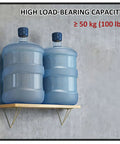 Rock Solid Heavy Duty Shelf Brackets In Matte Black Cast Iron Triangle Wall Mount Supports With Full Hardware Kit Easy Diy Floating Shelves That Handle Up To One Hundred Pounds Like A Champ holding two large water bottles on a wooden shelf.