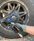 FlowPro 2.0 Digital Tire Inflator With Pressure Gauge 200 PSI ANSI Grade 1A Accuracy being used on a vehicle tire