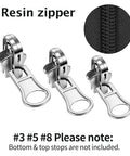 Close-up of resin zipper sliders from 9 Piece Universal Zipper Repair Kit With Pulls And Stops For Jackets Luggage Backpacks And Outdoor Gear Grab And Go Quick Slider Replacement No Sew Fix In Three Sizes Small Medium Large Black And Silver, showing sizes #3, #5, and #8 in silver.