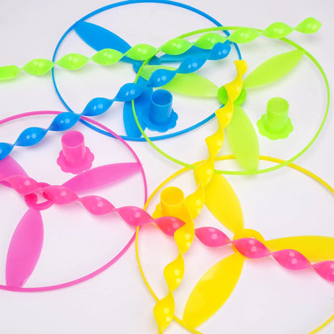 Colorful mix of blue, green, yellow, and pink 40 Pack Flying Disc Toys Twisty Helicopter Spin Copter Propeller Flyers with launchers.